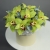 Композиция в шляпной коробке из 11 лаймовых орхидей в Электроуглях